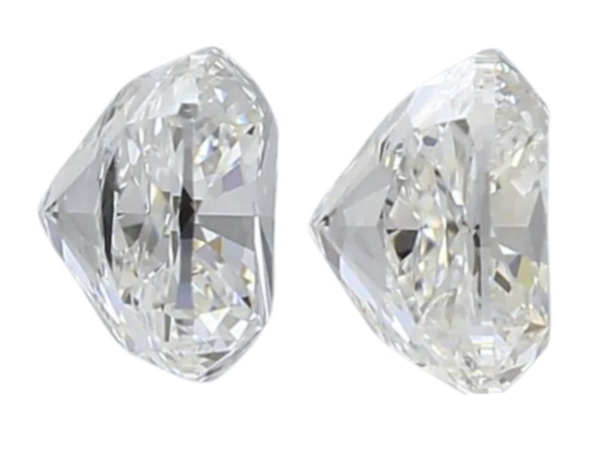 (GIA) 1.00CT ET PAR HØYKVALITETS PUTESLIPTE NATURLIGE DIAMANTER. G-H/VVS1-VVS2.